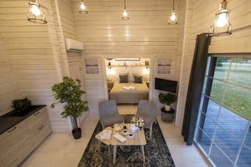 Фото номера Вилла с 1 спальней Виллы Harmony Park Countryside Villas &amp; SPA г. Пренай 5
